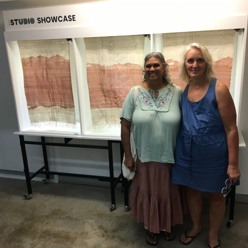 Credit: Veronica Calarco Susan and Veronica stood in front of artwork being desplayed