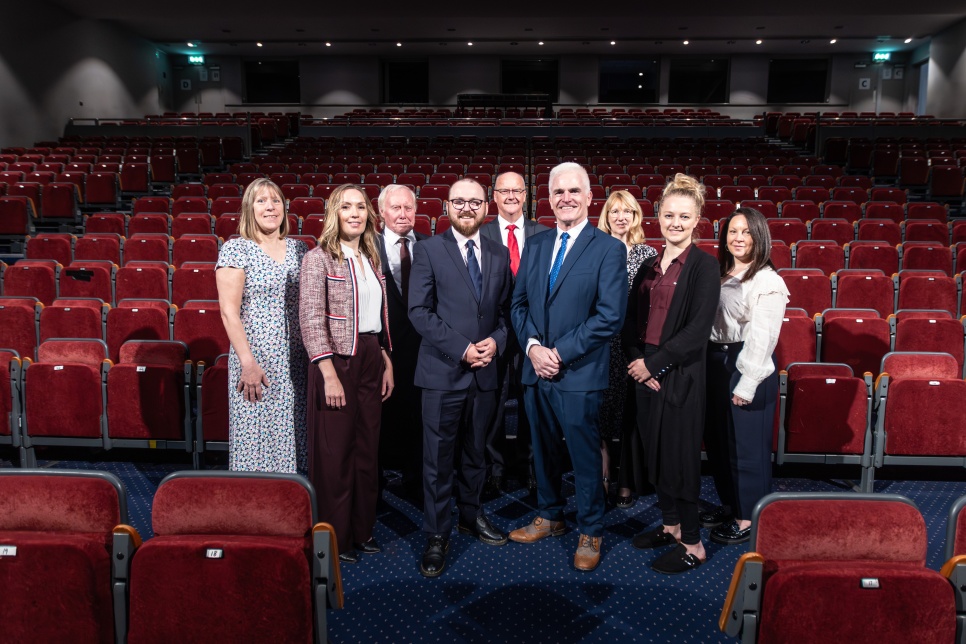 Capital Investment in Venue Cymru Llandudno Group of people standing in a theatre auditorium