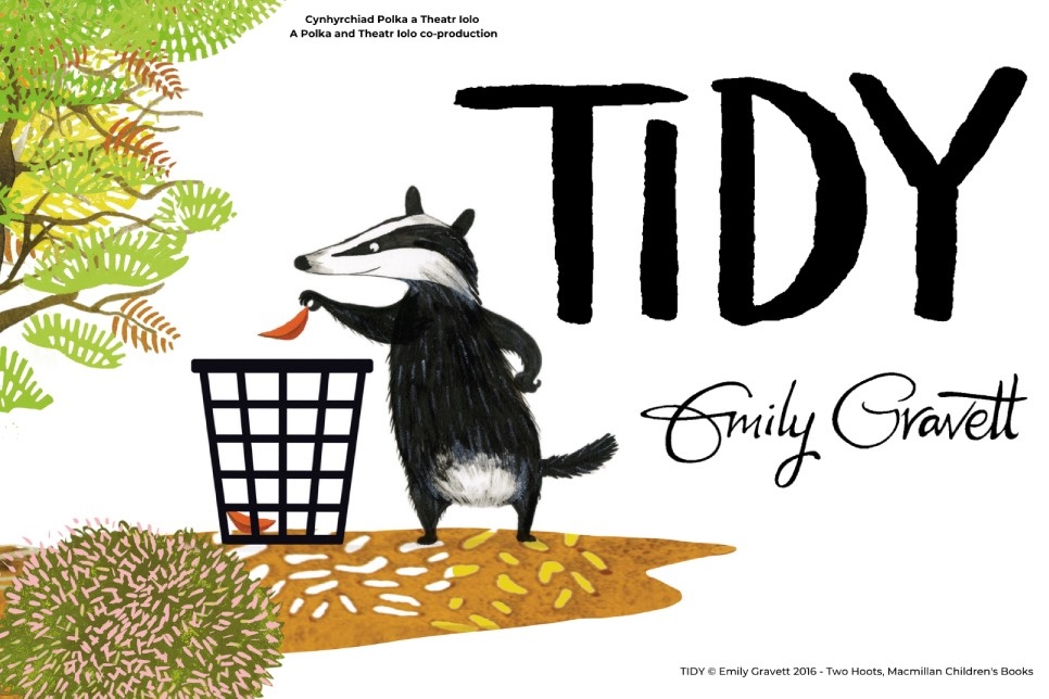 Illustration of a badger who is putting a leaf in the bin. Next to him is the word Tidy in large black font