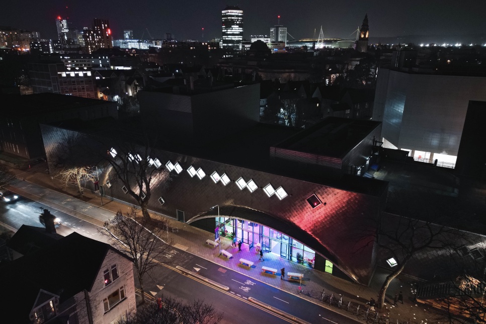 Photograph – a nighttime photo from the air of Sherman theatre (Photo by Chris Lloyd) / Ffotograff – Llun a dynnwyd yn ystod y nos yn edrych i lawr o’r awyr ar Theatr Sherman (Ffotograff gan Chris Lloyd)  