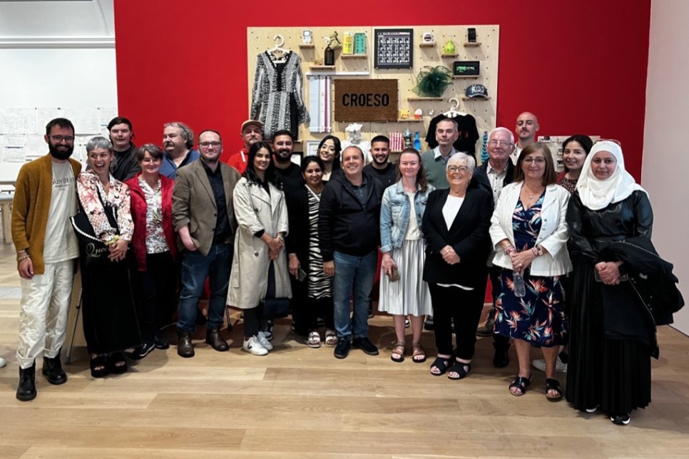Tŷ Pawb traders and playworkers in an exhibition