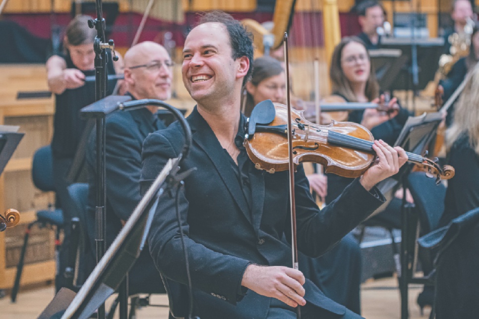 Person playing a violin